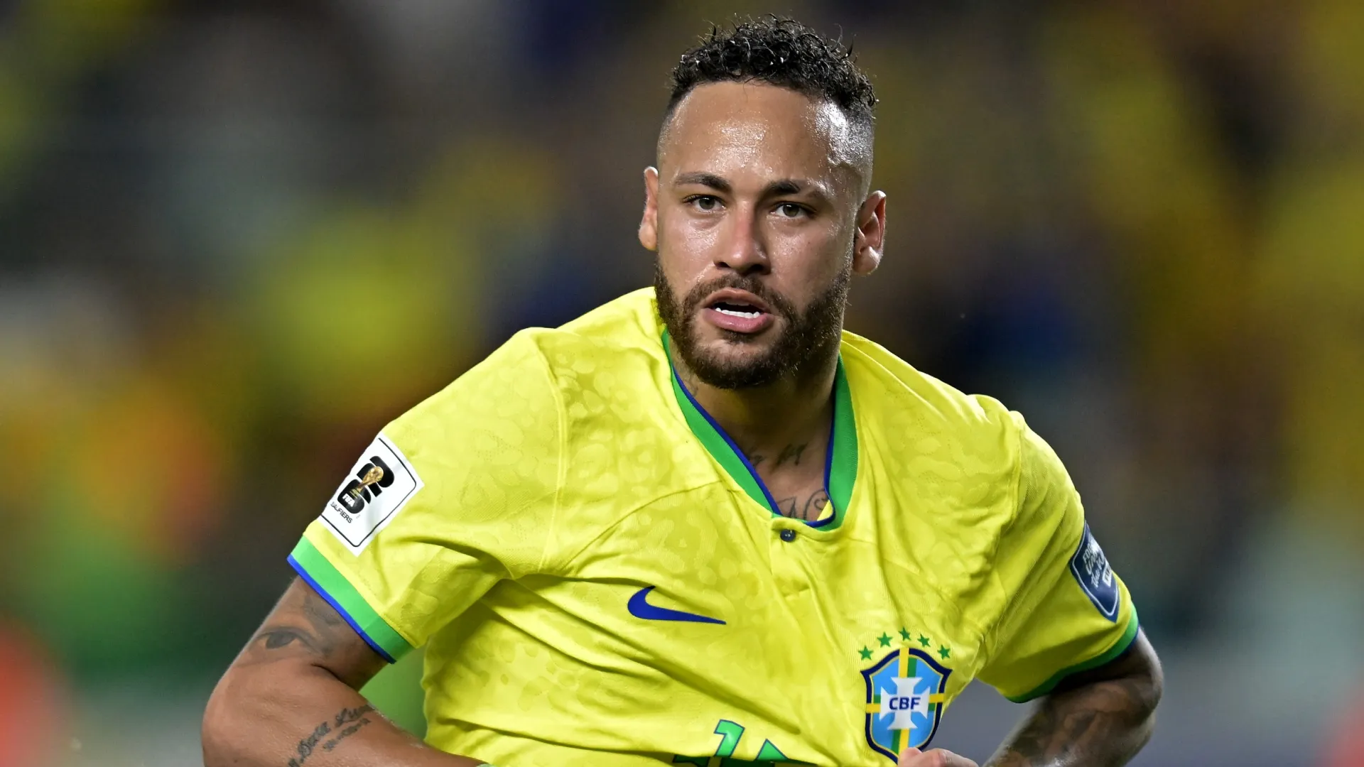 Neymar showing Brazil's jersey