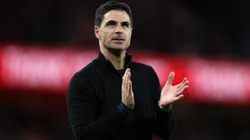 Mikel Arteta, Manager of Arsenal, claps the fans.