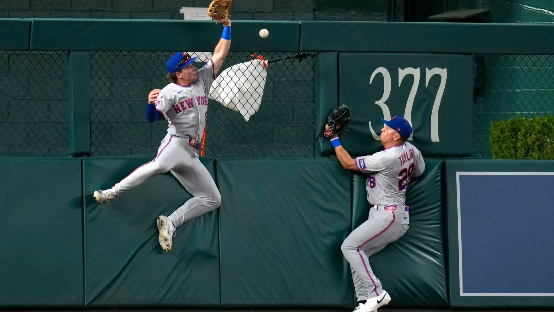 Nick Morabito and Tyrone Taylor of the Mets are unable to make the catch on a fly ball. Jess Rapfogel/Getty Images