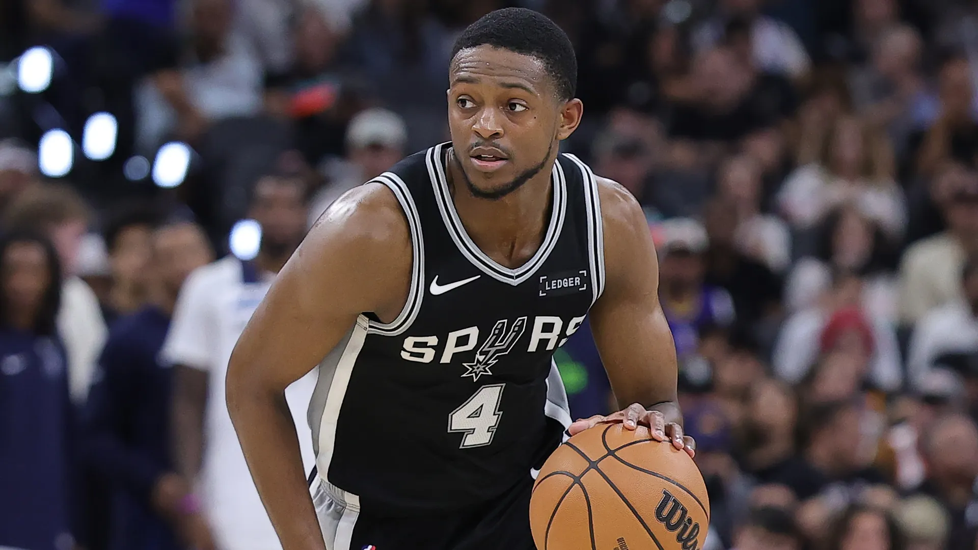 De’aaron Fox #4 of the San Antonio Spurs brings the ball up court against the Timberwolves (Source: Alex Slitz/Getty Images