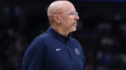 Jason Kidd of the Dallas Mavericks watches action.