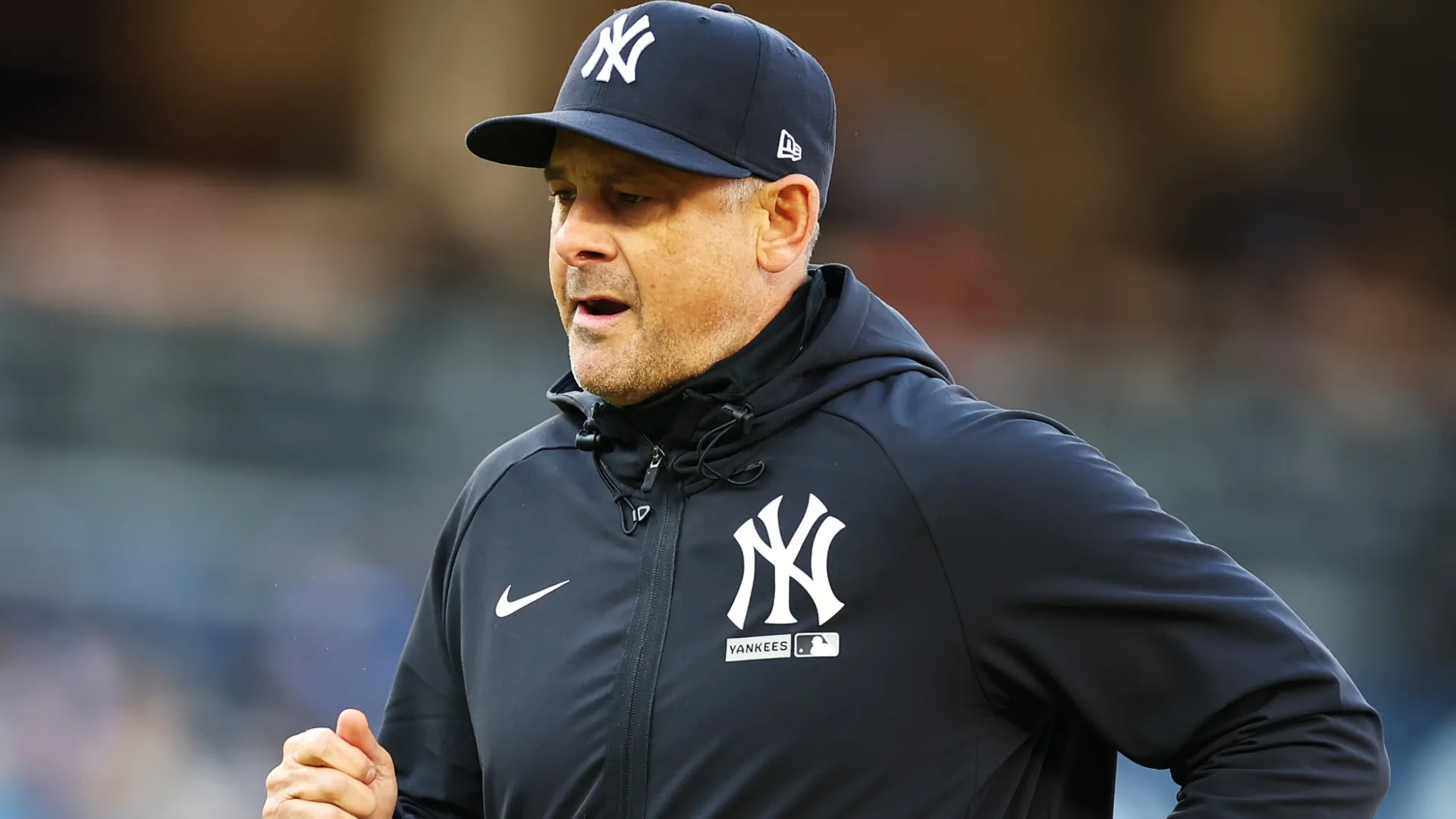 Aaron Boone #17 of the Yankees heads to the dugout. Al Bello/Getty Images