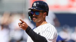 Trent Grisham #12 of the Yankees reacts after hitting a 3-run RBI triple.