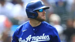 Max Muncy #13 of the Dodgers walks to the dugout.