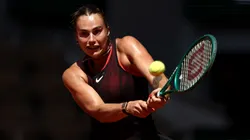 Aryna Sabalenka plays a backhand.