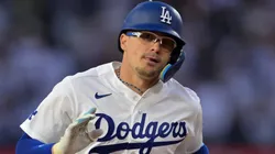 Kike Hernandez #8 of the Dodgers rounds the bases after hitting a solo home run.