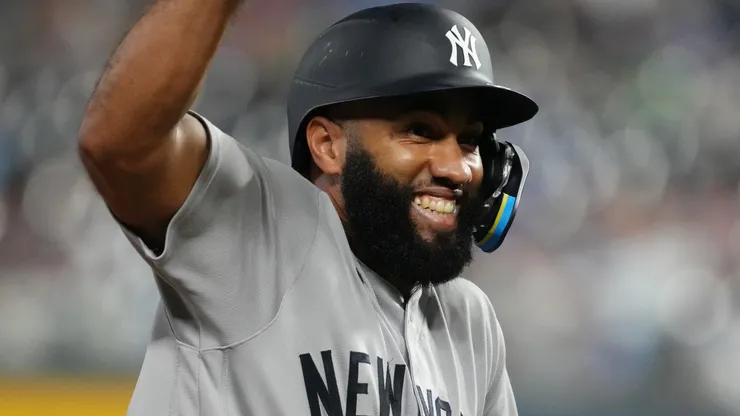 Amed Rosario #14 of the New York Yankees celebrates a two-run home run.