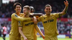 Adam Wharton of Crystal Palace celebrates scoring with teammates during the Premier League match