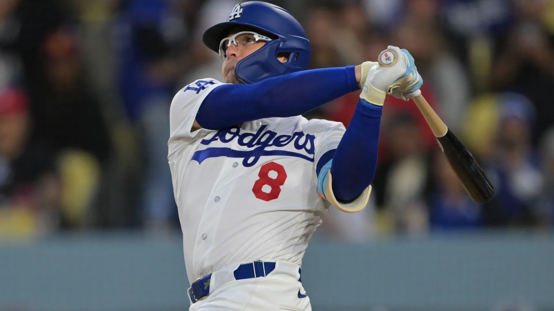 Kike Hernandez #8 of the Dodgers hits a solo home run vs Rockies. Jayne Kamin-Oncea/Getty Images