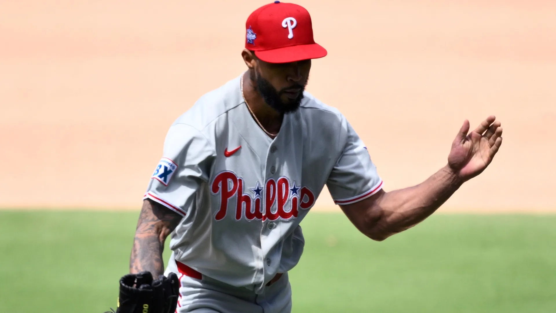 Cristopher Sánchez #61 of the Phillies celebrates after pitching the seventh inning against the Padres. Ramirez/Getty Images
