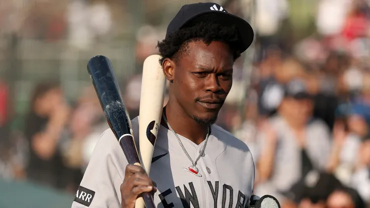 Jazz Chisholm Jr. #13 of the New York Yankees walks to the dugout.