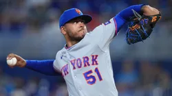 Freddy Peralta #51 of the Mets throws a pitch against the Marlins.