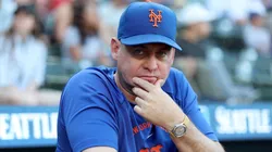 Carlos Mendoza #64 of the Mets looks on before the game against the Mariners