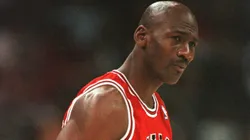Michael Jordan #33 of the Chicago Bulls walks to the bench during the first quarter of their game in 1996