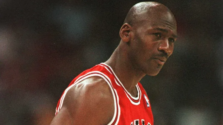 Michael Jordan #33 of the Chicago Bulls walks to the bench during the first quarter of their game in 1996