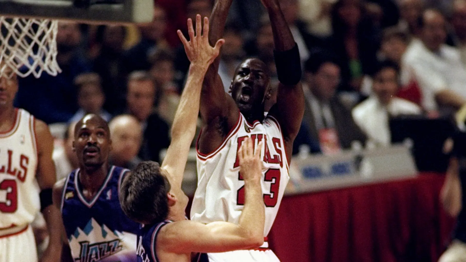 Michael Jordan in action against Jeff Hornacek of the Utah Jazz during the 1998 NBA Finals Game 4 (Source: Al Bello /Allsport)