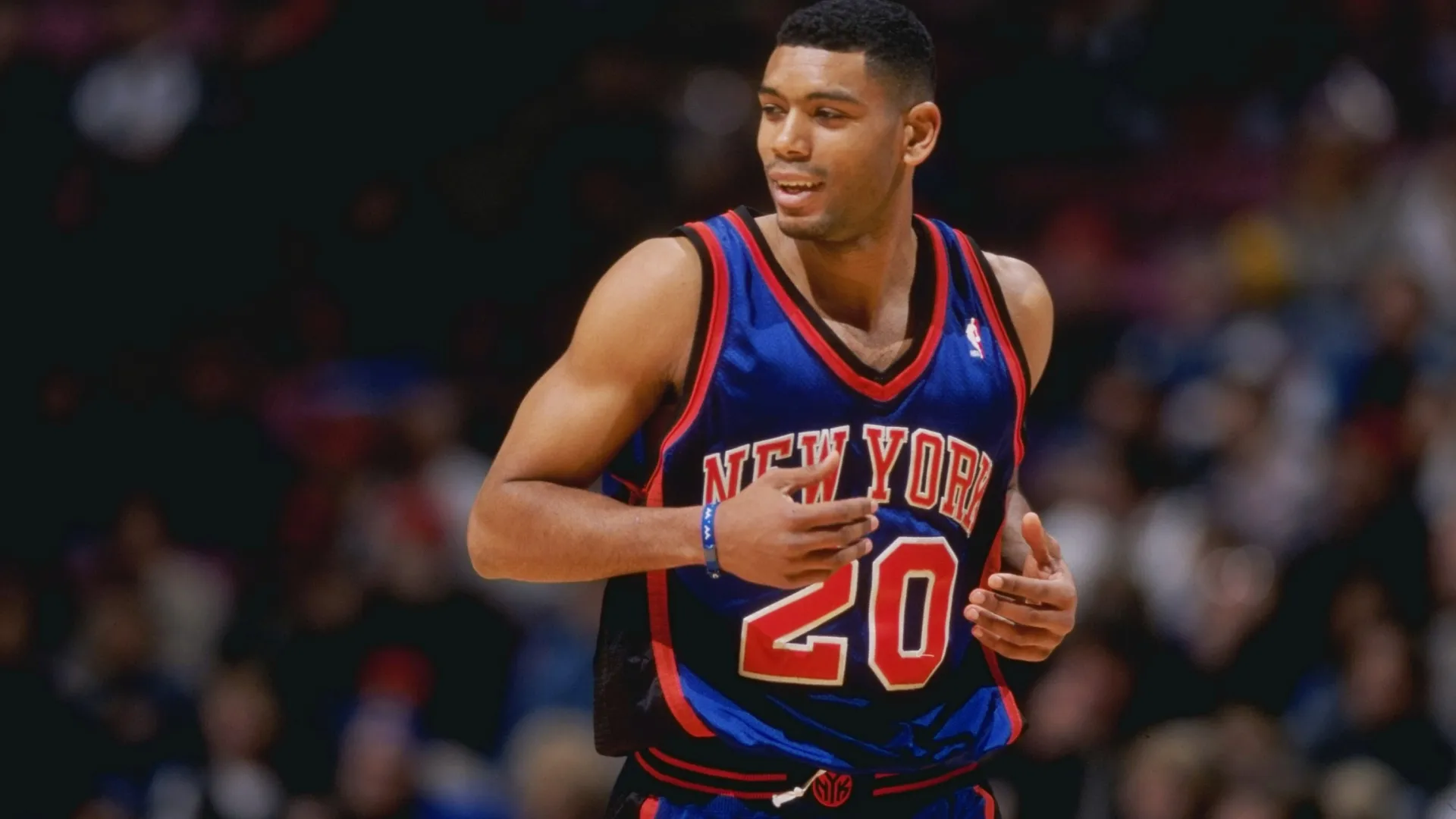 Allan Houston #20 of the New York Knicks runs down the court during a game in 1999 (Source: Ezra O. Shaw /Allsport)