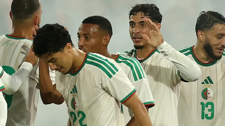 Anis Hadj Moussa of Algeria celebrates scoring his team's first goal.