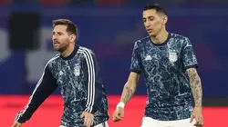 Lionel Messi and Angel Di Maria of Argentina warm up.