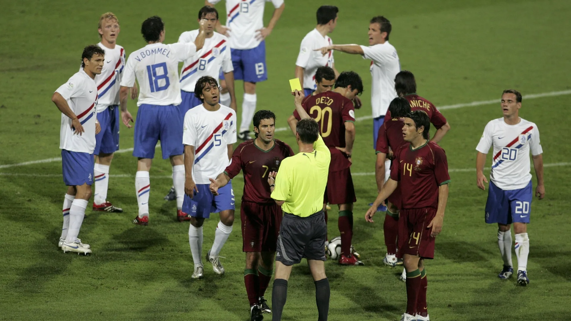 Luis Figo is shown the yellow card by Referee Valentin Ivanov during the FIFA World Cup Germany 2006 Round of 16 match (Source: Alexander Heimann/Getty Images)