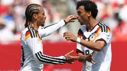 Leroy Sané of Germany celebrates with teammate Nathaniel Brown.