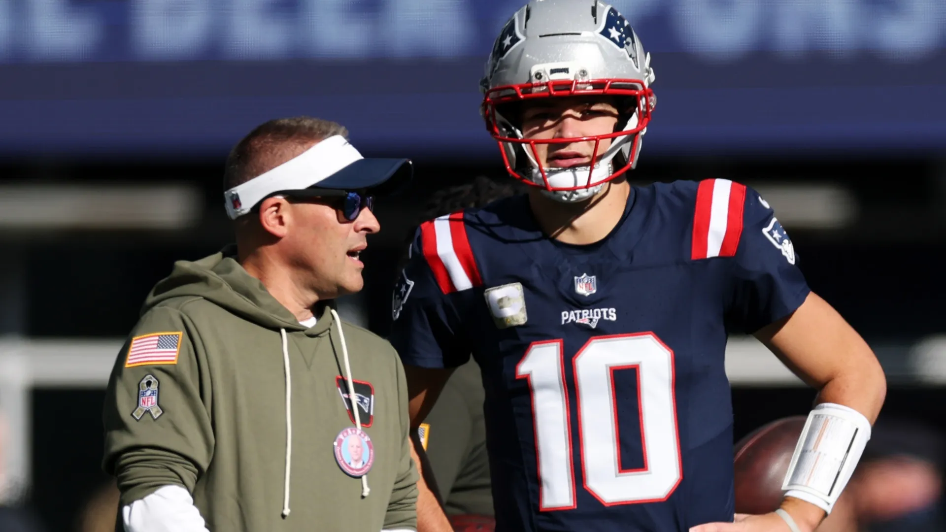 Josh McDaniels with Drake Maye
