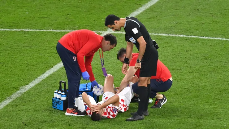 Andrej Kramaric of Croatia receives medical attention during the FIFA World Cup Qatar 2022.