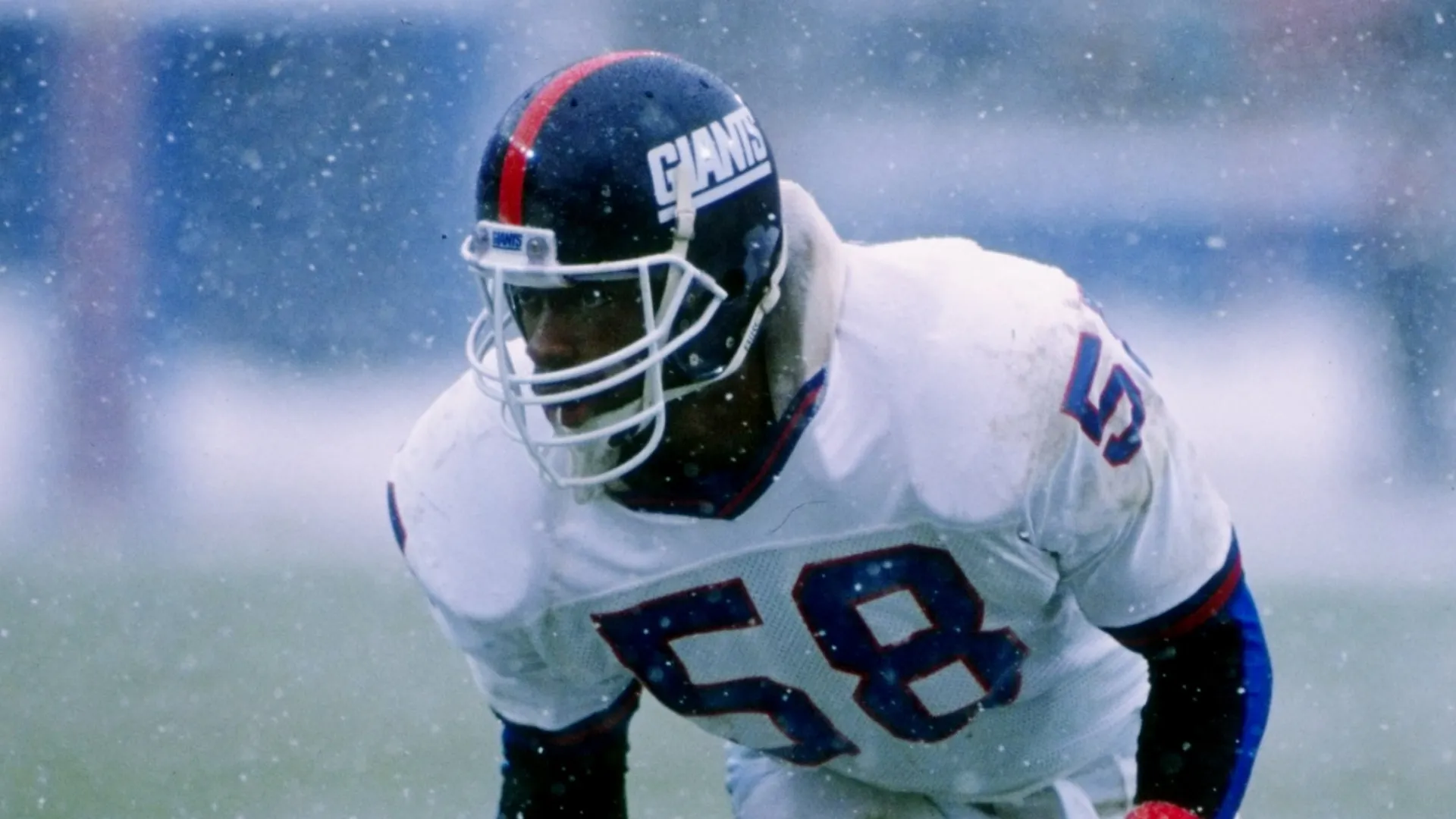 Carl Banks playing for the Giants.