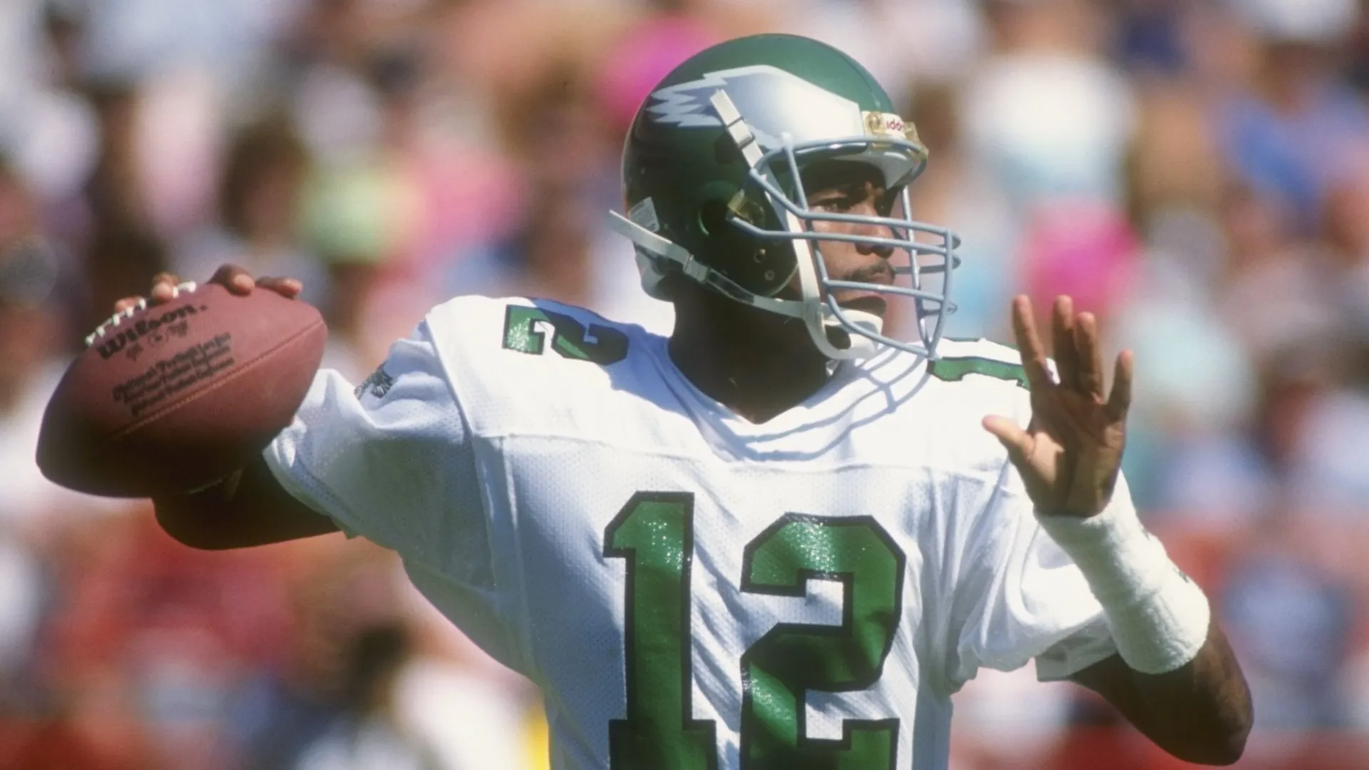 Randall Cunningham throwing a pass.