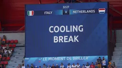 A screen inside the stadium indicates a cooling break.