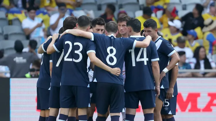 Guatemala huddled up.