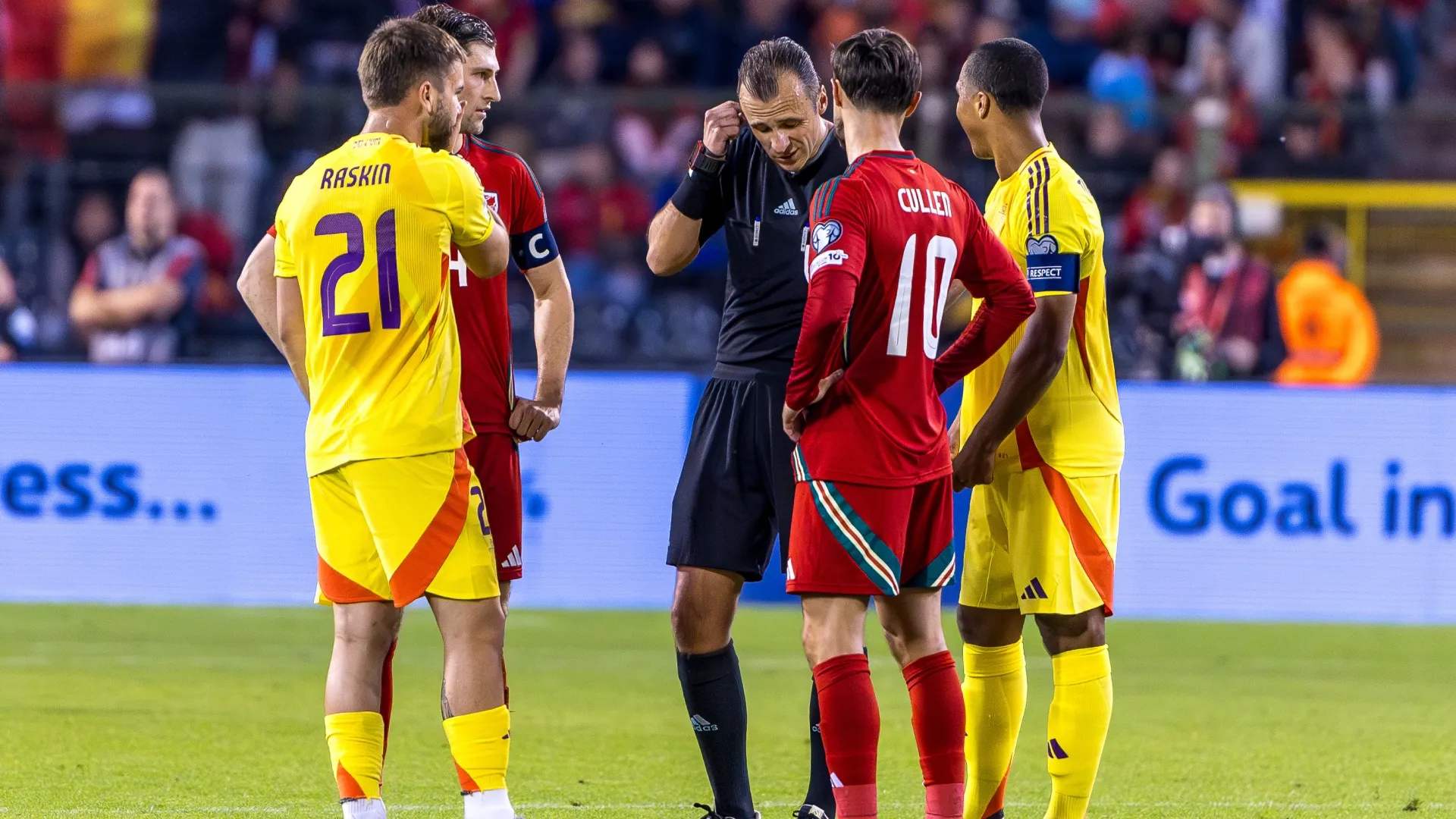Referee Irfan Peljto talks to the VAR assistants about a possible disallowed goal during a FIFA 2026 Qualifier (Source: Omar Havana/Getty Images)