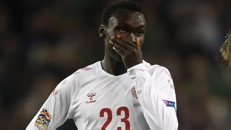 Pione Sisto of Denmark covers his mouth.