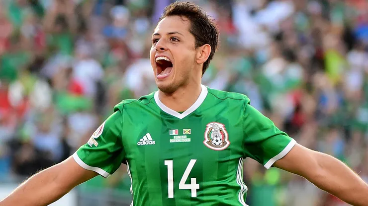 Chicharito #14 of Mexico celebrates after his goal.