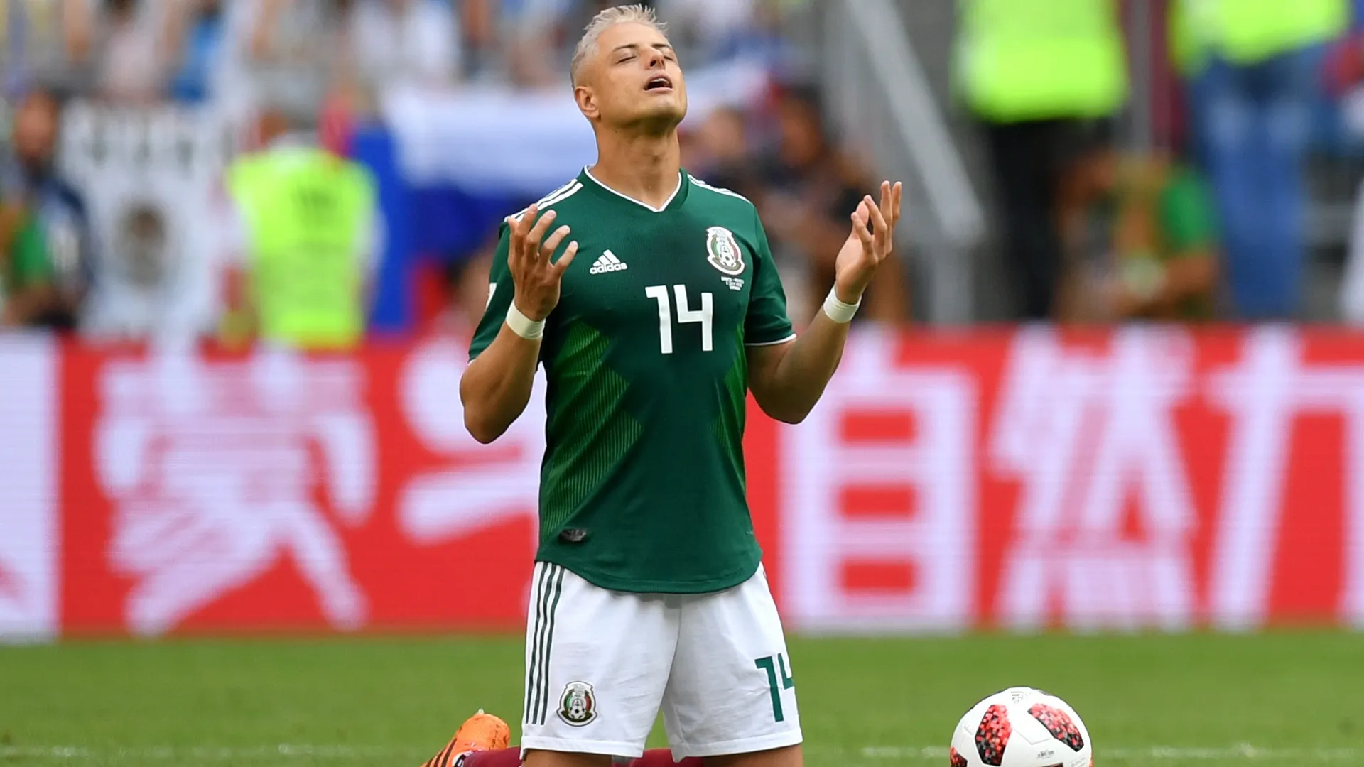 Javier Hernandez of Mexico prays prior to the 2018 FIFA World Cup Russia Round of 16 match. Dan Mullan/Getty Images