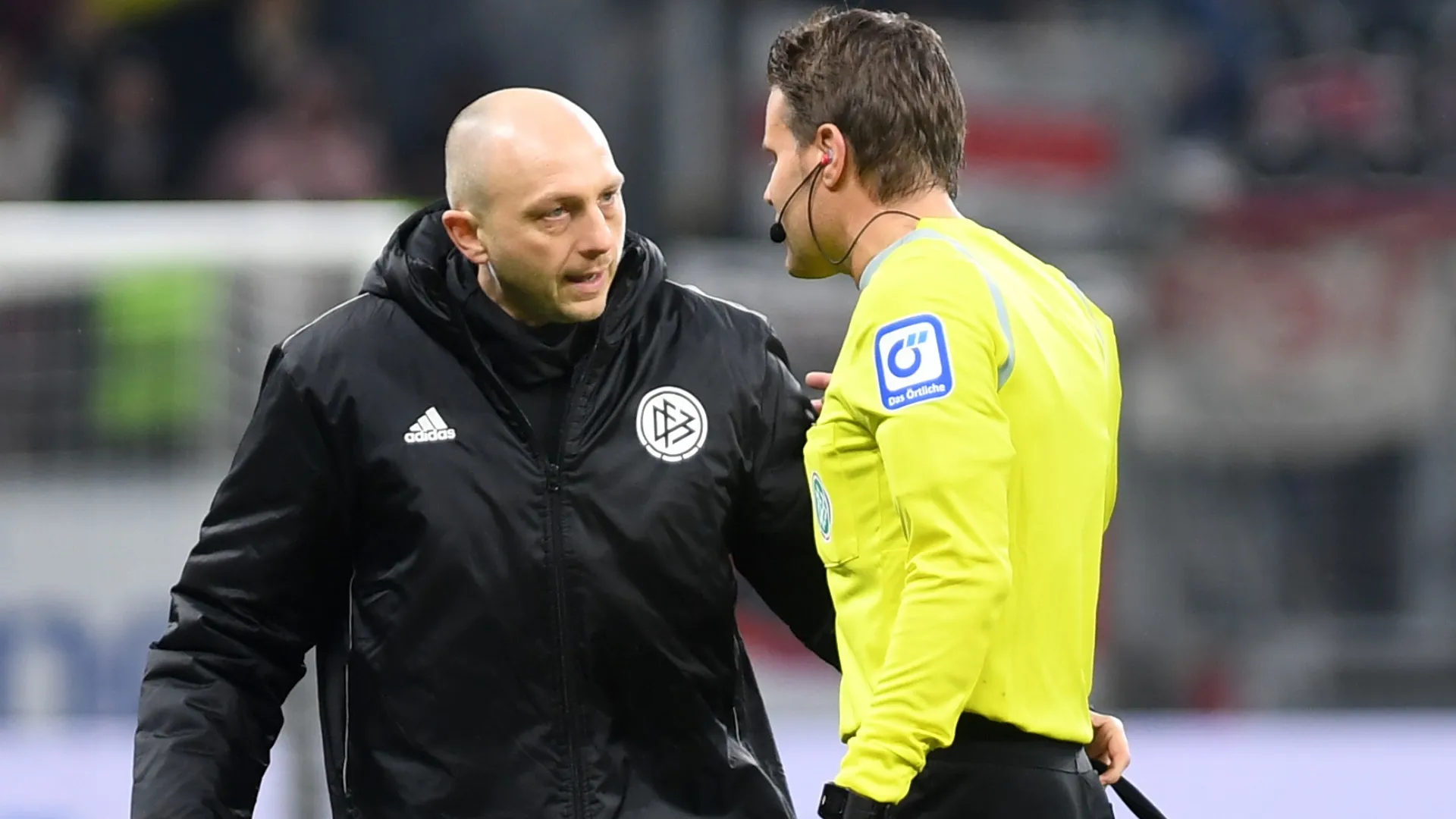 Referee is being attended by a doctor