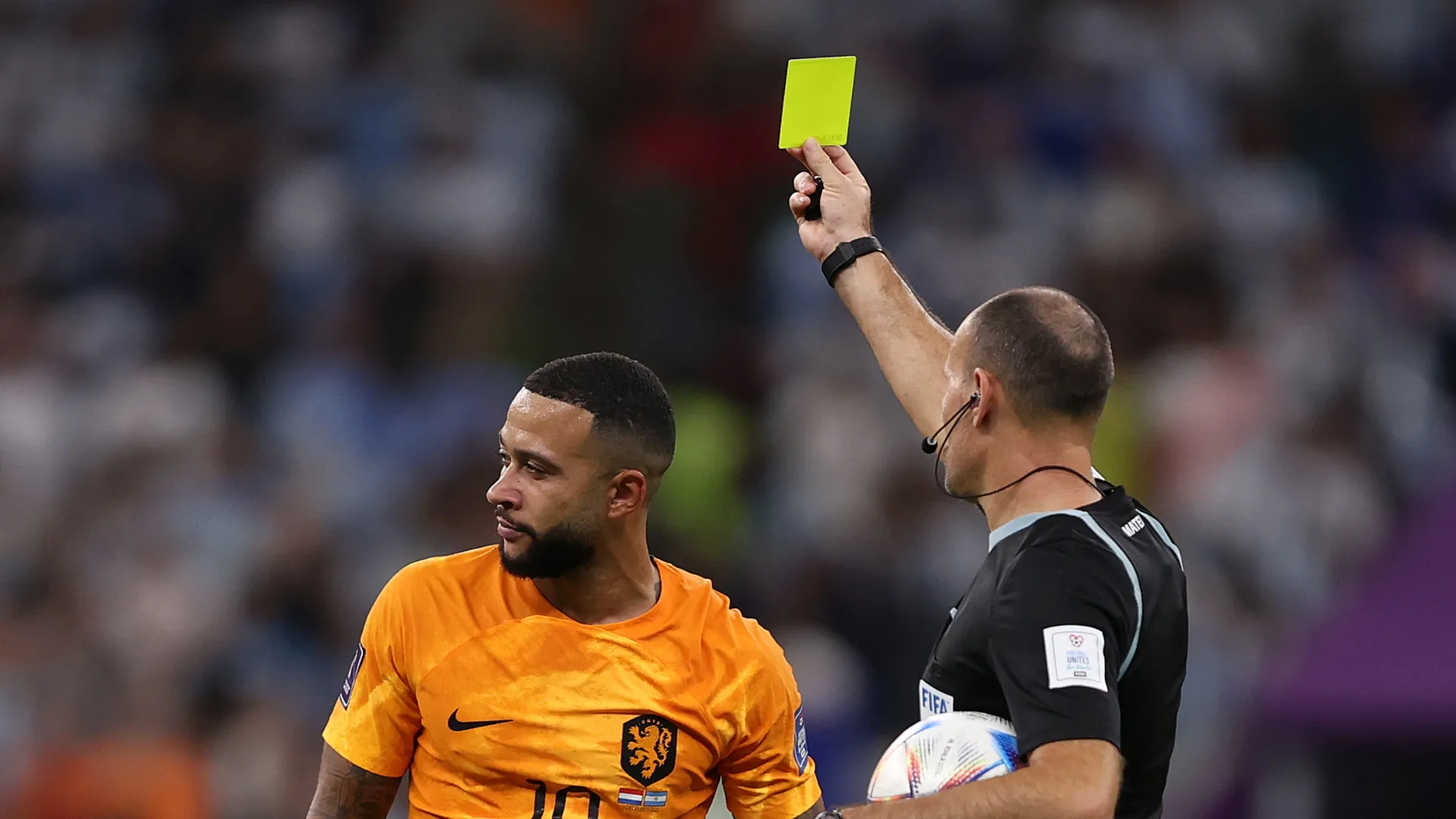 Memphis Depay is booked in 2022 World Cup.