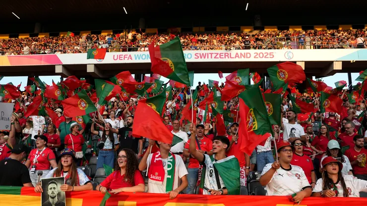 Fans of Portugal wave their national flag