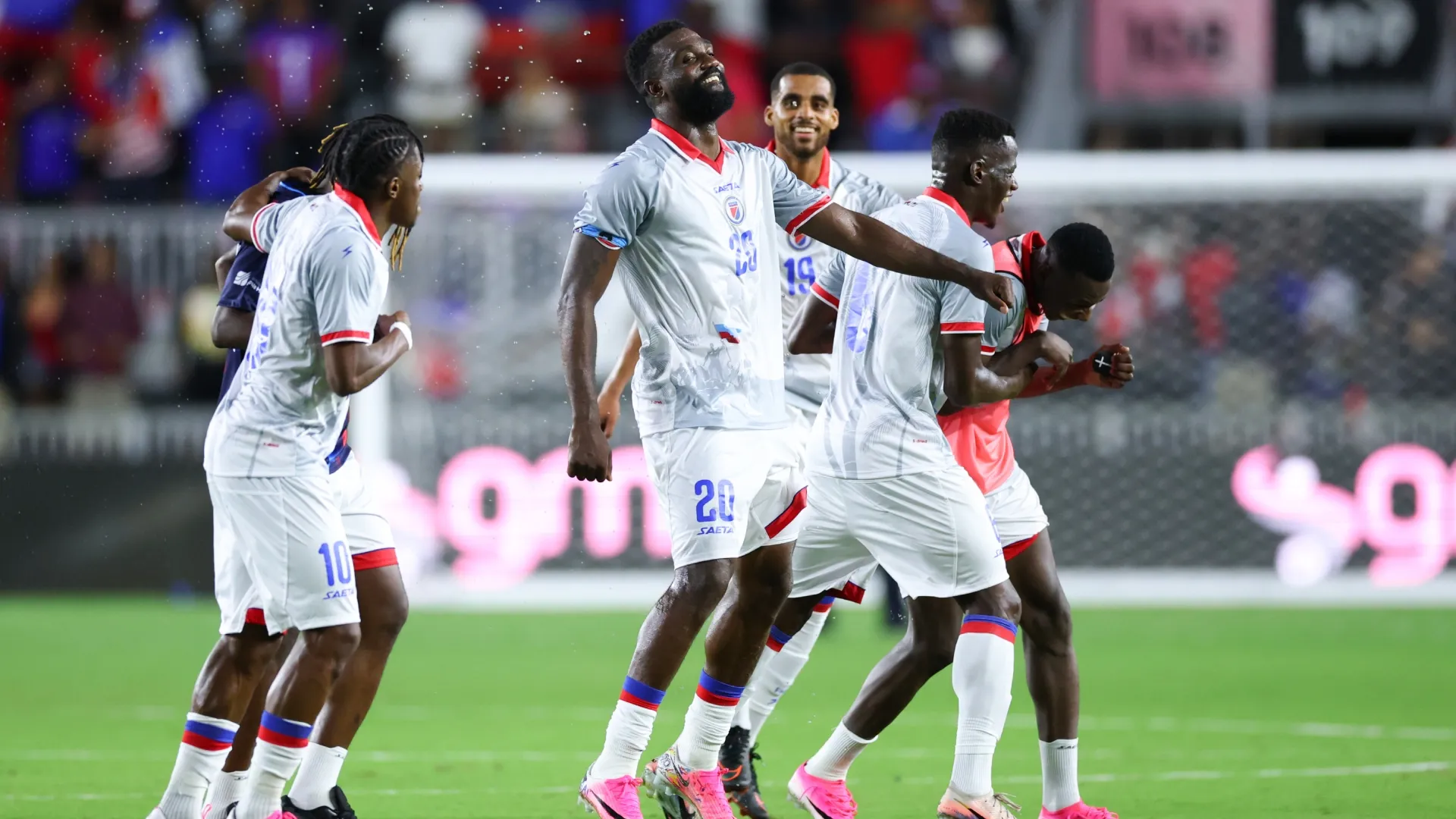Frantzdy Pierrot #20 of Haiti celebrates with teammates