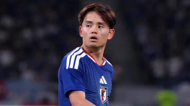 Takefusa Kubo of Japan looks on.