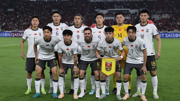 China players line up for team photo.