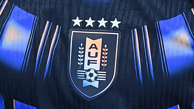 A close-up look at Uruguay's crest with four stars.
