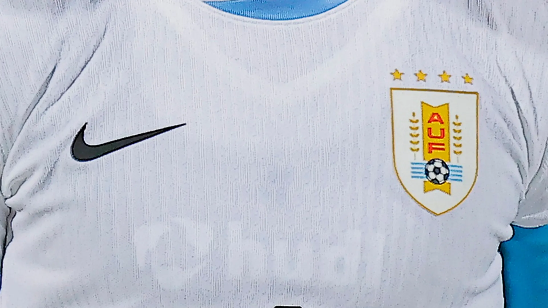 Uruguay’s crest with four stars.