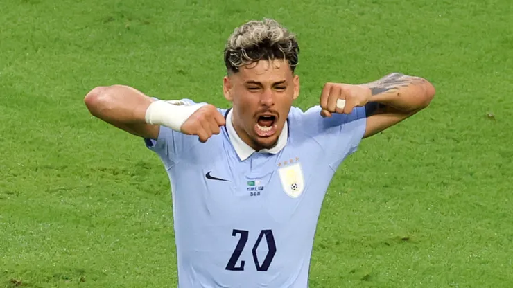 Maxi Araujo #20 of Uruguay celebrates scoring his team's first goal.