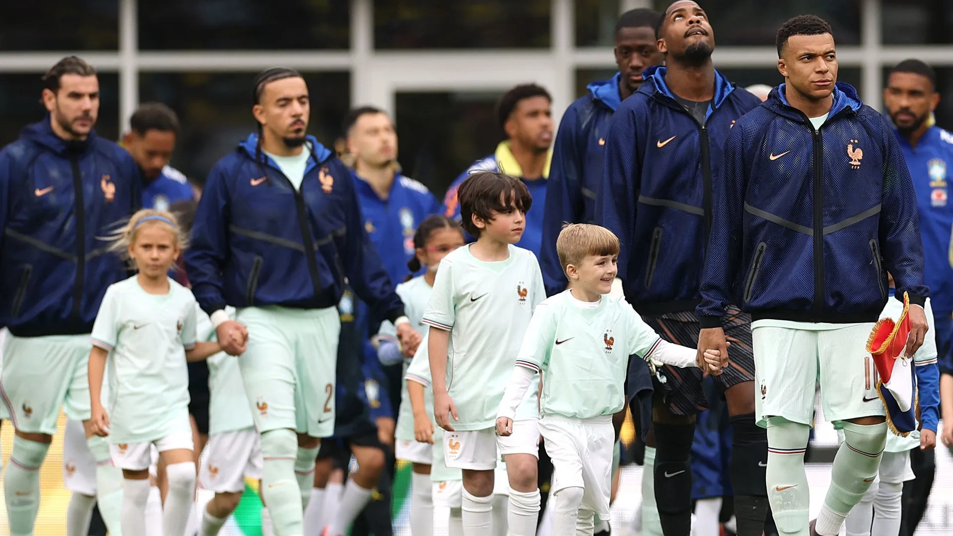 Kylian Mbappé #10 of France leads his team onto the pitch before the international friendly match. Maddie Meyer/Getty Images