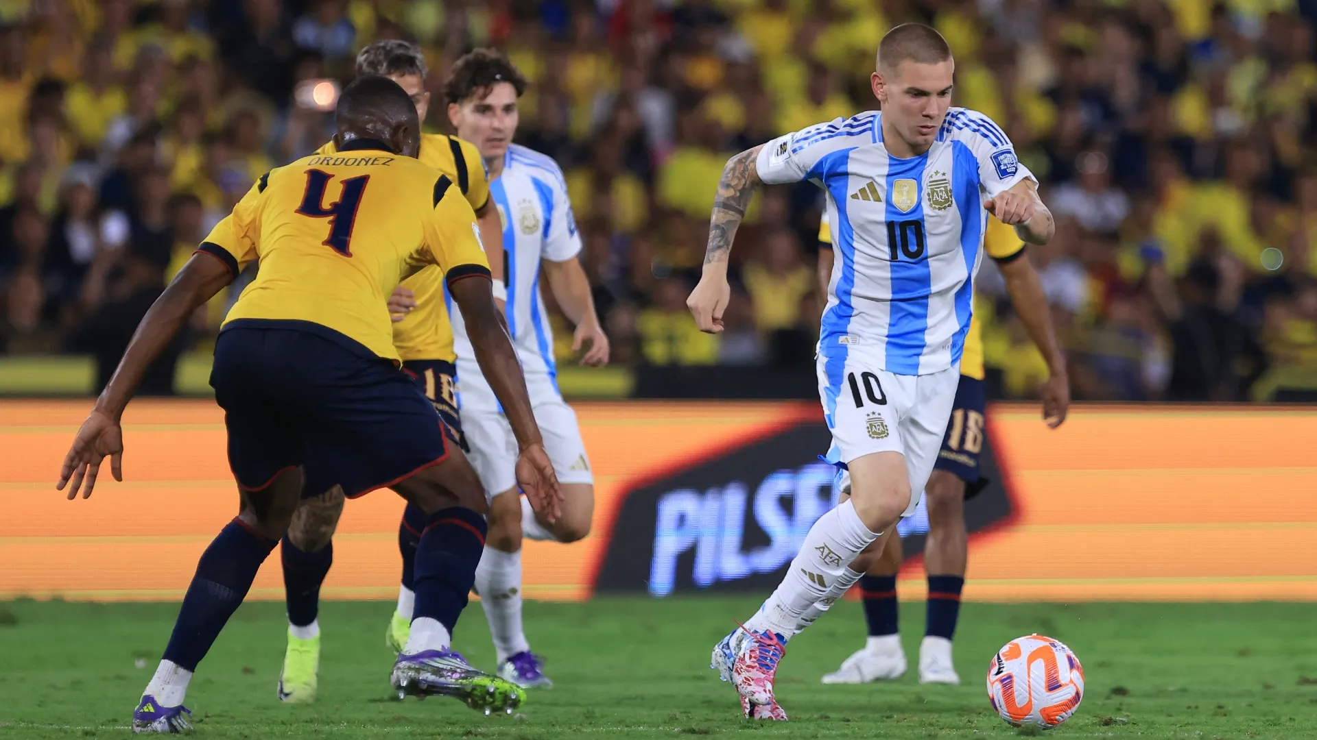 Franco Mastantuono of Argentina is challenged by Joel Ordoñez of Ecuador. Franklin Jacome/Getty Images