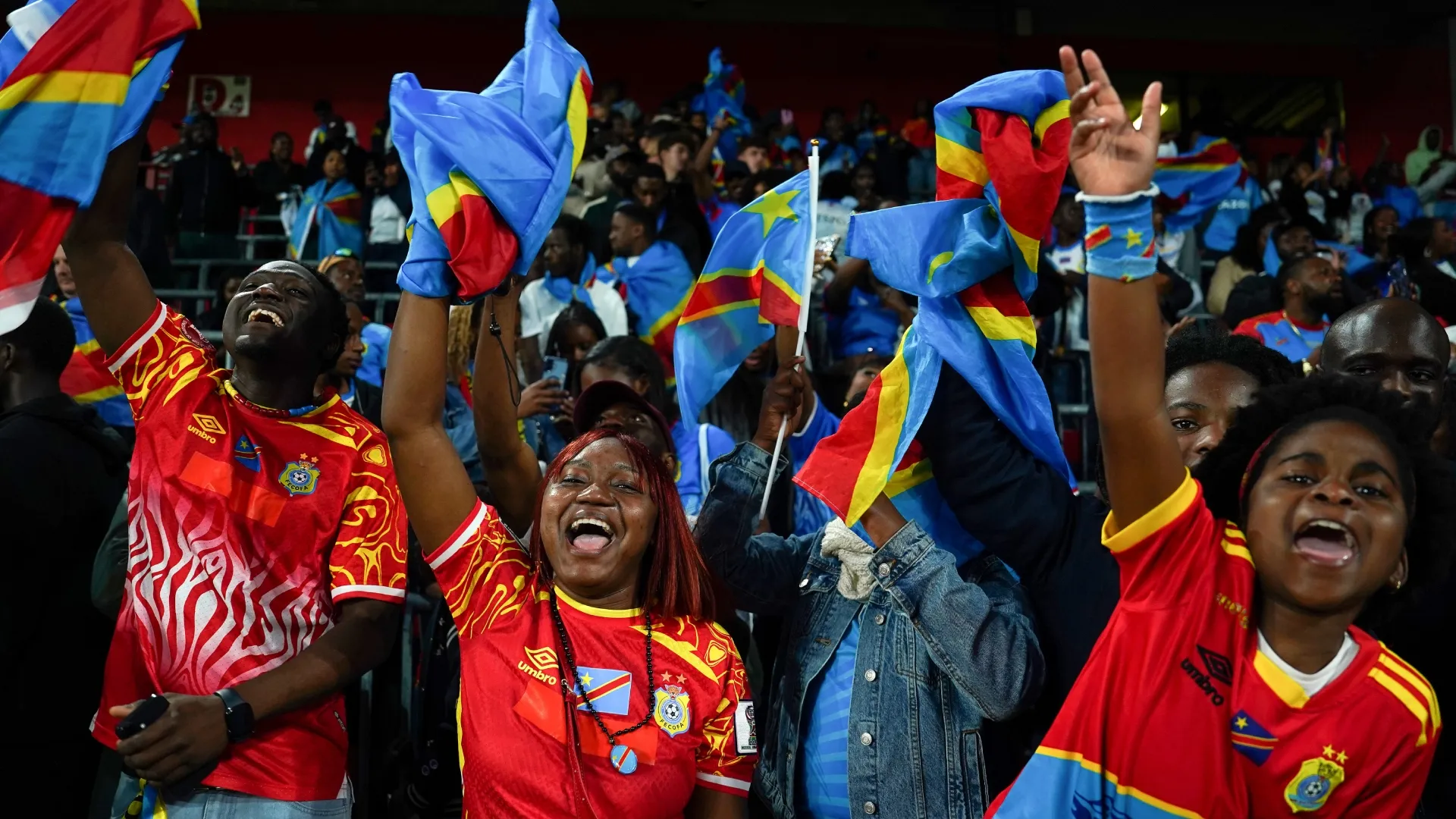 Fans of DR Congo show their support from the stands during the international friendly match (Source: Pau Barrena/Getty Images)