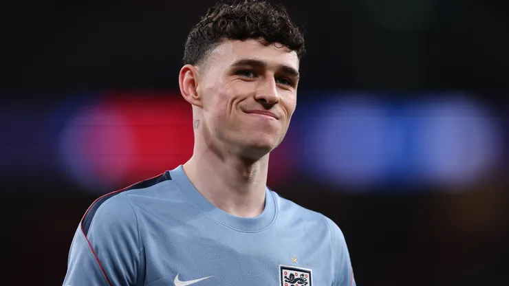 Phil Foden of England warms up ahead of the international friendly match