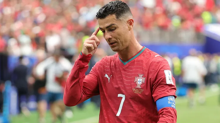 Cristiano Ronaldo #7 of Portugal walks off the pitch after the 1-1 draw.