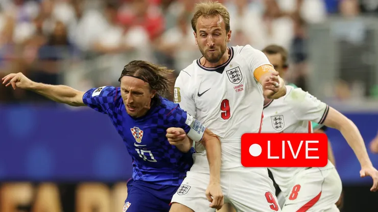 Luka Modric #10 of Croatia is challenged by Harry Kane #9 of England.